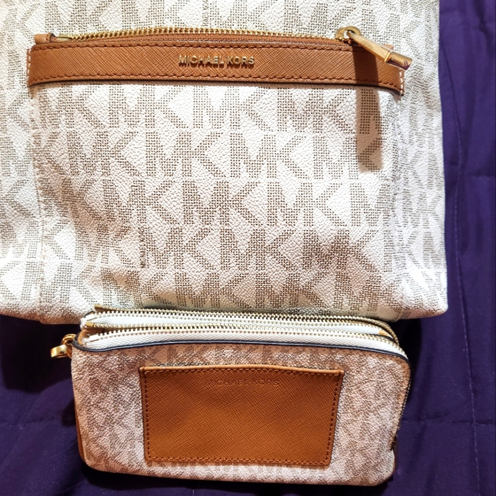 Michael Kors purse with matching wristlet.